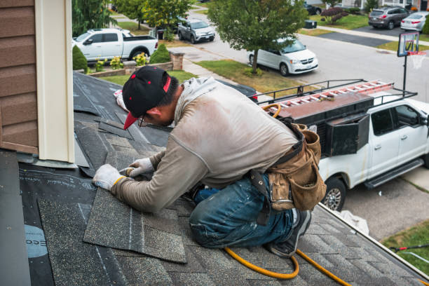 Professional Roofing technician working in Urbana, IL